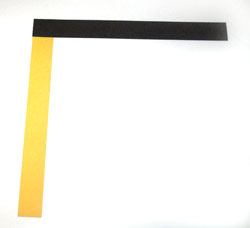 two strips of paper at right angles
