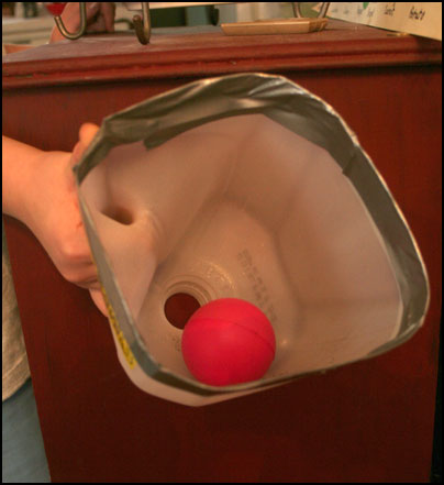 milk jug scoop with ball inside
