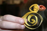 photo: five-year-old holding up a quilled duck